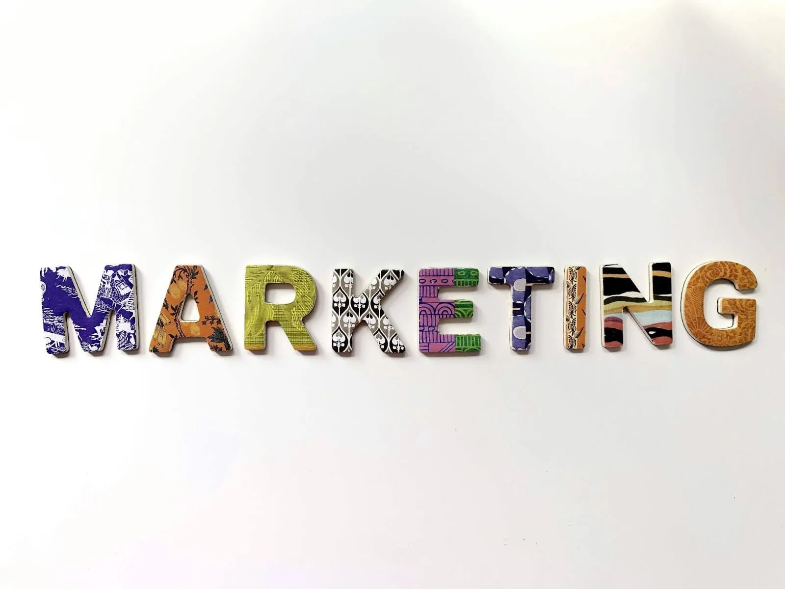 The word "marketing" out of different colored letters.