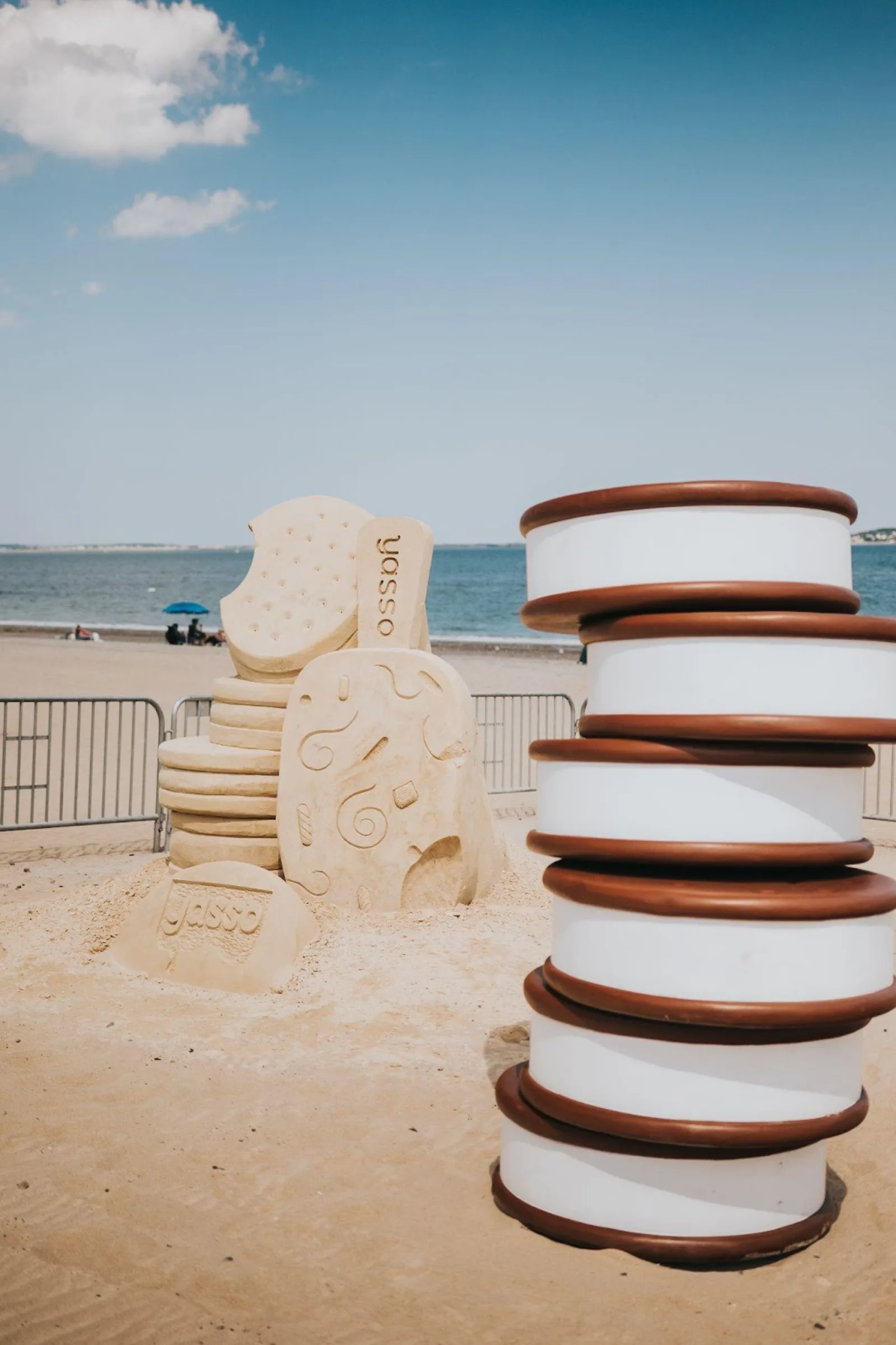 Yasso sand carvings and display in the middle of a beach as a form of guerilla marketing.