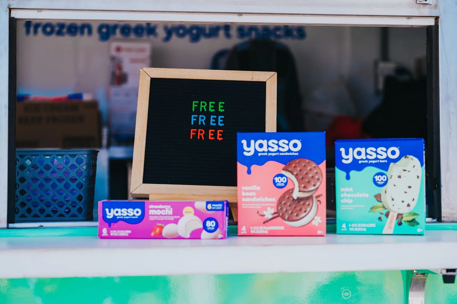 A brand ambassador handing a sample to a consumer