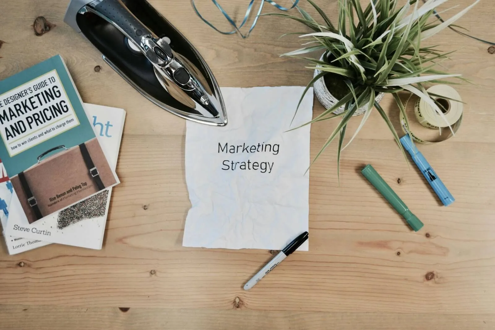 Piece of paper with words "marketing strategy" on it, signifying experiential marketing.