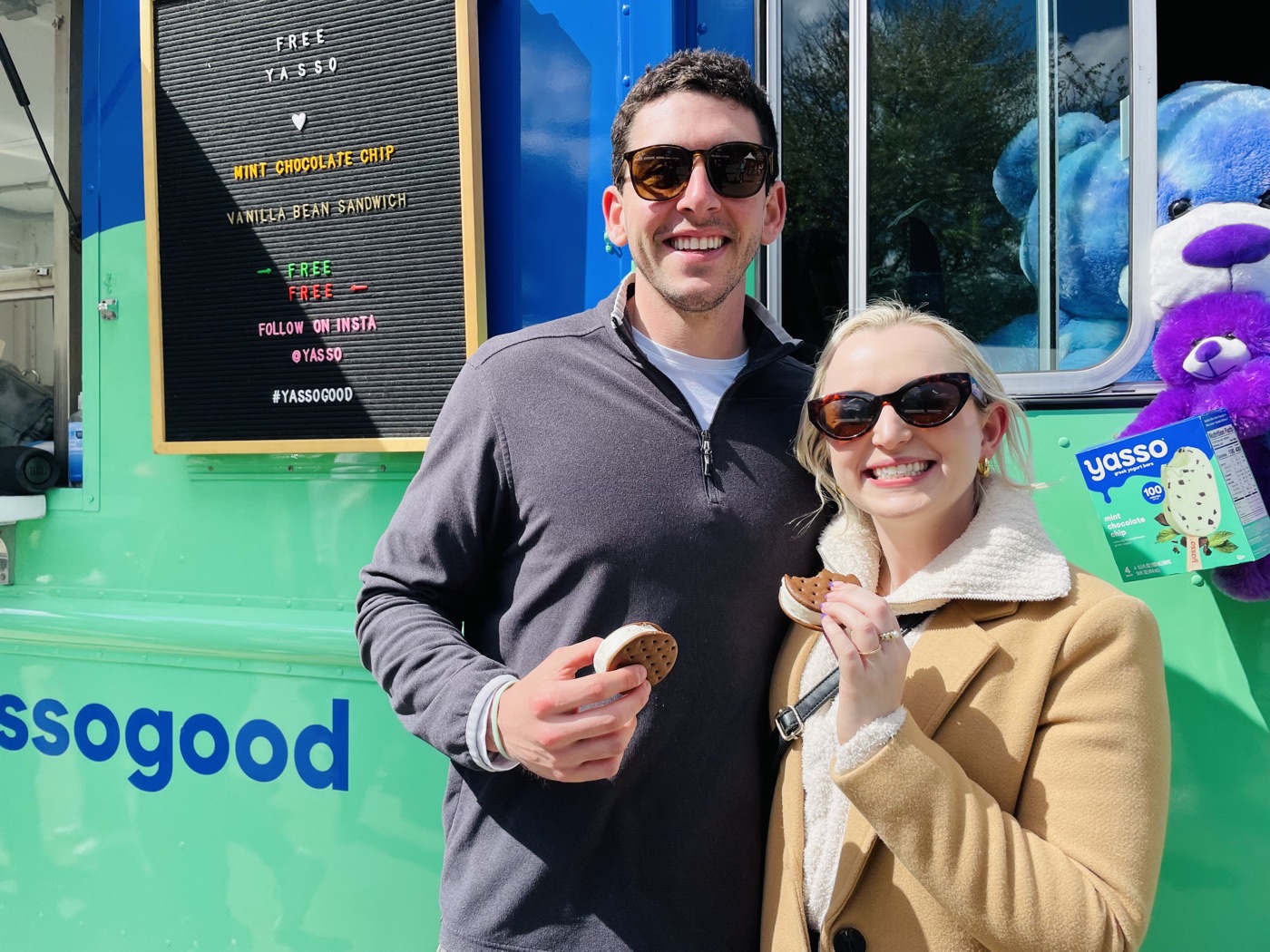 Yasso brand ambassadors handing out frozen yogurt bar samples from a branded food truck as part of a CPG sampling measurement program